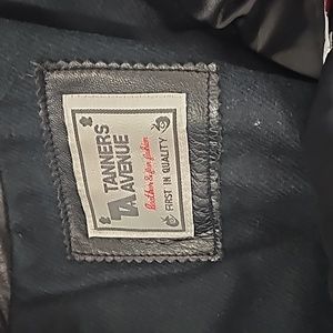 Leather coat with faux mink